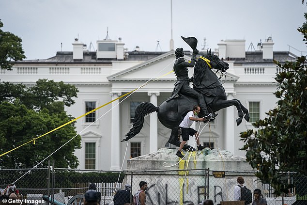 Four men charged for vandalizing andrew jackson statue in washington dc